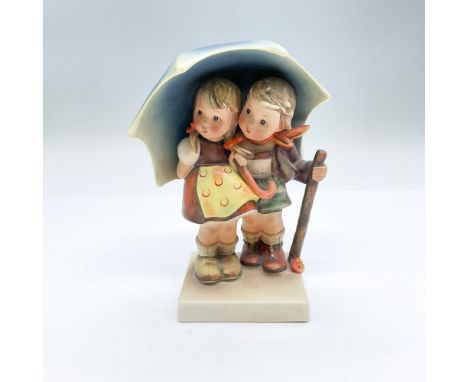 Hand painted figurine of a young girl and boy under a large umbrella. Goebel backstamp. Issued: 20th centuryDimensions: 4.5"L