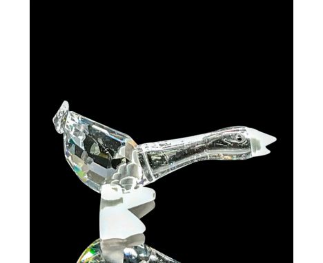 Clear faceted crystal figure of a duck with frosted beak and feet. Swarovski mark. Item number 7613NR000003. Part of the Barn