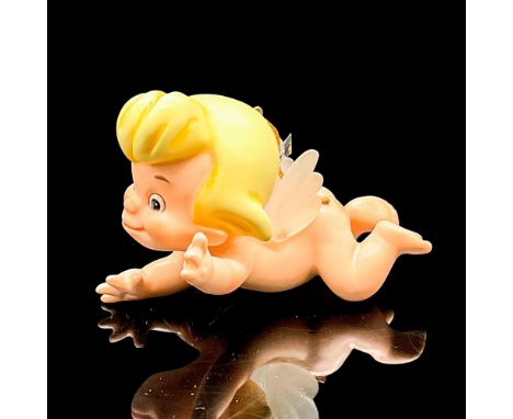 Walt Disney Classic Collection porcelain figurine of Cupid from Fantasia, called Flight of Fancy. This item has its original 