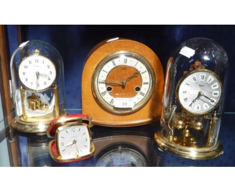 A 1950S WALNUT-CASED 'SMITHS' MANTEL CLOCK, two anniversary clocks and a travel clock