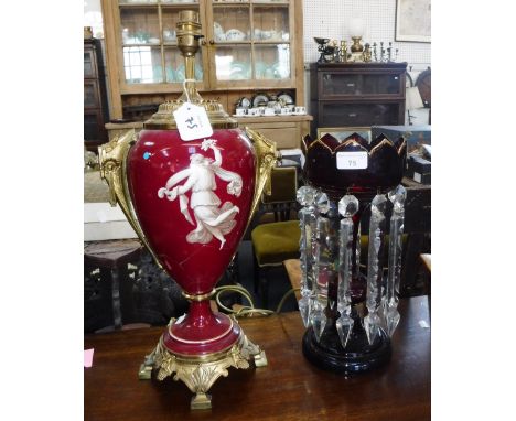A VICTORIAN RUBY GLASS LUSTRE, and a Victorian brass oil lamp, with central red ceramic body (Damaged and converted to electr
