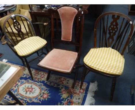ERCOL: A WINDSOR TYPE ARMCHAIR with Prince-of-Wales feathers, with an Edwardian folding chair and a Windsor wheel-back side c