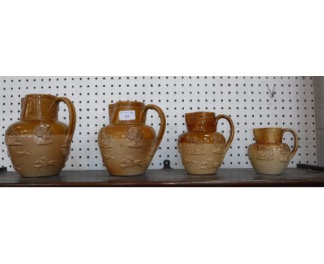 T SMITH & CO: A SET OF FOUR 19TH CENTURY GLAZED STONEWARE JUGS decorated with hunting scenes