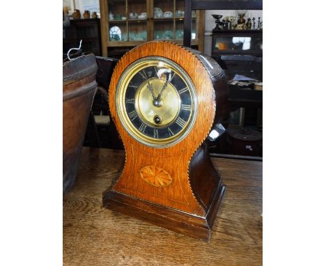 A LATE 19TH CENTURY OAK-CASED 'BALLOON' MANTEL CLOCK