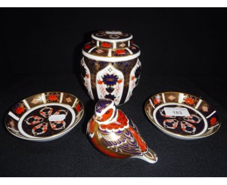 ROYAL CROWN DERBY ; AN IMARI BIRD, with gold button, a ginger jar, and two small dishes