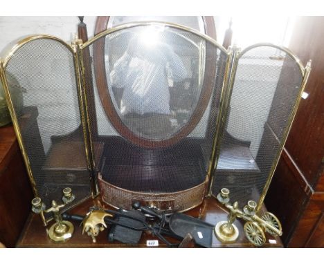 A BRASS FIREGUARD and a collection of similar metalware