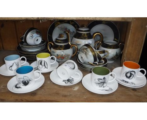 SUSIE COOPER: A SET OF SIX COFFEE CUPS with saucers, decorated with fruit and a Japanese eggshell tea set