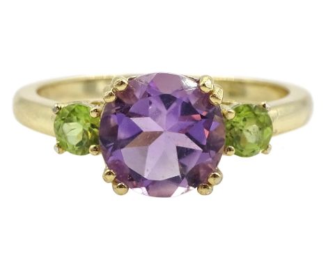 Silver-gilt three stone amethyst and peridot ring, stamped 925Condition Report:Size R, good condition