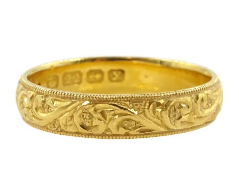 Early 20th century 22ct gold wedding band, with engraved scroll decoration, Birmingham 1923Condition Report:Approx 5.15gm, si