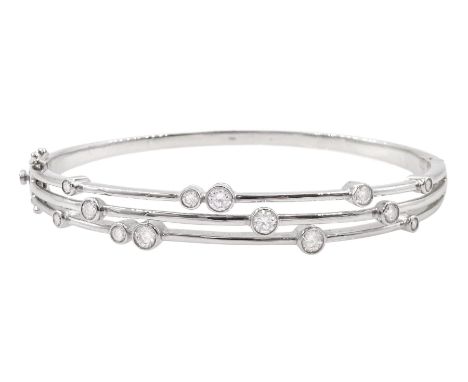 18ct white gold three row rubover set, round brilliant cut diamond hinged bangle, three strand bangle, total diamond weight a