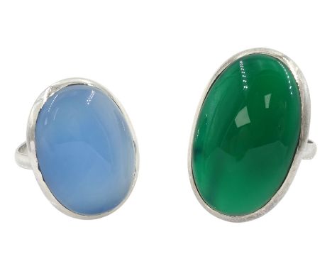 Silver blue chalcedony ring and a silver green agate ring, both stamped 925Condition Report:Blue stone size R, green agate si