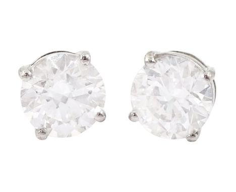 Pair of 18ct white gold round brilliant cut diamond stud earrings, total diamond weight approx 2.05 caratCondition Report:Goo