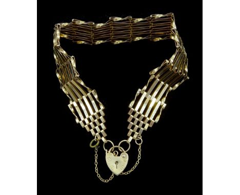 9ct gold six bar gate bracelet, with heart locket clasp, hallmarkedCondition Report:Approx 6.2gm