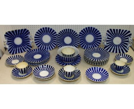 A Bloor Derby tea and dinner service, decorated with a radiating alternating bands in cobalt blue and white, c.1820