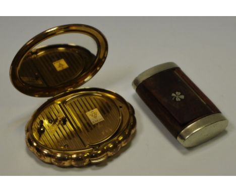 A light musical compact, paste set bow; an early 20th century snuff box; four leaf closer (2)