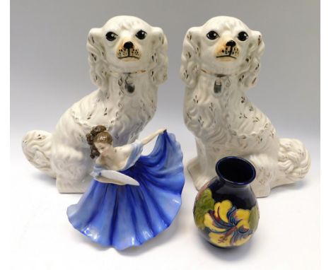 4 pieces of pottery , to include a 1970's Moorcroft Hibiscus vase , A Royal Doulton figure , Elaine (seconds) and a pair of 2