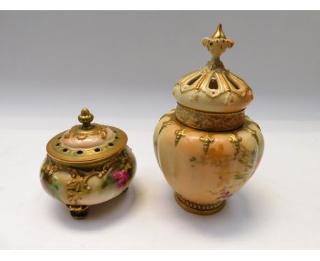 Two early 20th Century Royal Worcester blush ivory pot puri lidded mantle/table pots with hand painted flower detail.