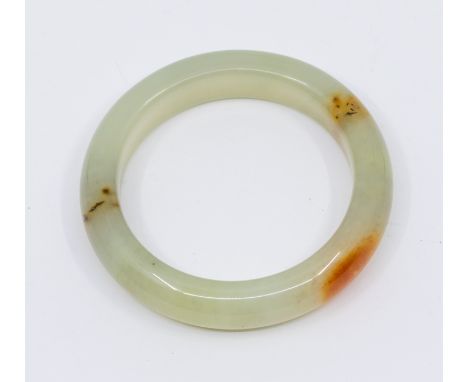 A nephrite jade bangle, D section, width approx 15mm, internal diameter approx 58mm, total weight approx 70gms, along with bo