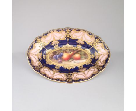 A Royal Worcester Oval Dessert Dish, painted with fruit, Pears and plums, within pink, cobalt blue and raised gilt borders. S