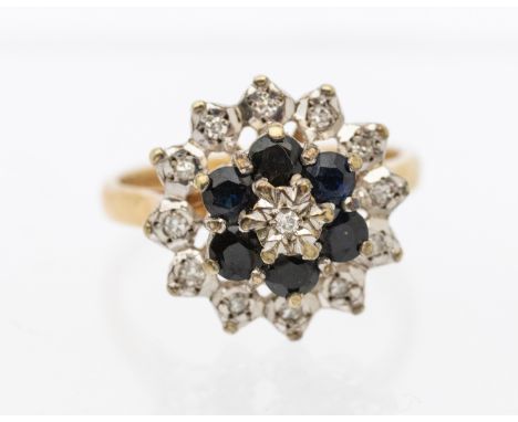 A sapphire and diamond 9ct gold cluster ring, claw set, approx 8mm diameter, size N, total gross weight approx 3.8gms    Furt