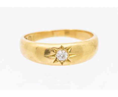 A diamond and 18ct gold gypsy set ring, set with a small old cut diamond approx 0.10ct, width approx 5mm, size P, total gross