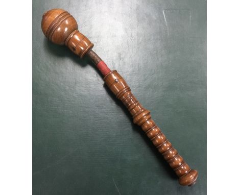 An early 19th century turned mahogany press gang cosh. Ring turned handle area, with knopped finial. Bulbous head with double