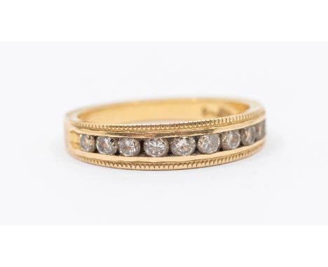 A diamond set 14ct gold half eternity ring, width approx 4mm,  size M1/2,  total gross weight approx 3gms   Further details: 