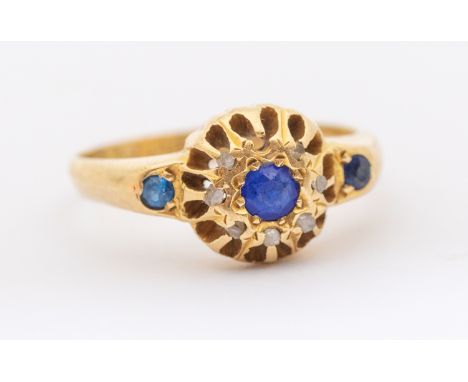 A Victorian sapphire and diamond 18ct gold ring, set with round mixed cut sapphires, small diamond set accents, width approx 