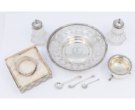 A collection of silver to include; a Sterling silver circular trinket/bonbon dish, pierced design, ribbed border and initiall