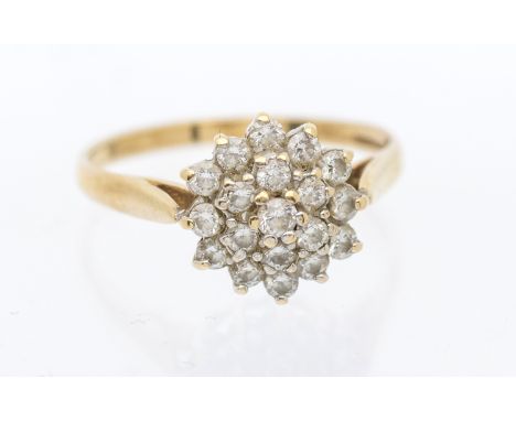 A diamond set cluster 9ct gold ring, circular mount, claw set with small round brilliant cut diamonds, setting approx 9mm, si