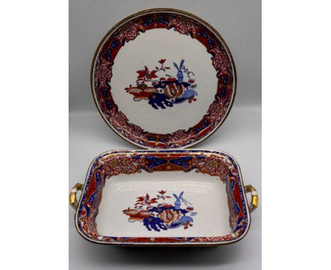 Spode - An 'Old Imari' twin handled tureen, gilt detail, along with a circular 'Old Imari' tureen stand, both with stamped ma