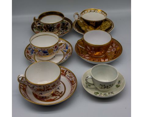 A collection of 19th century English porcelain tea cups and saucers, mostly Spode, various patterns. Condition: wear to gildi