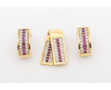 A ruby and diamond 14ct gold pendant, ribbon like form with a central row of calibre cut rubies within diamond grain set bord