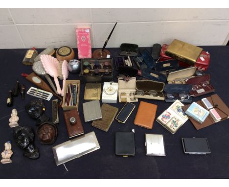 A mixed collectors lot containing spectacles in cases, perfumes, playing cards, pens, fans, dressing table items, paints and 