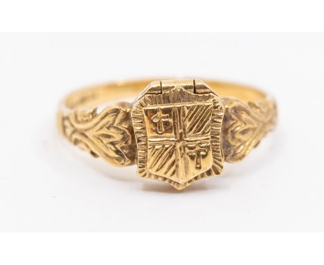 A 9ct gold poison ring, shield shaped with case decoration, width approx 9mm, size P1/2, weight approx 3.5gms   Further detai