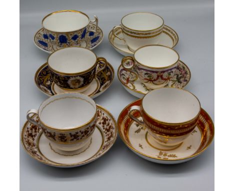 A small collection of 19th century English porcelain tea cups and saucers, mostly Spode, various patterns. Condition: wear to