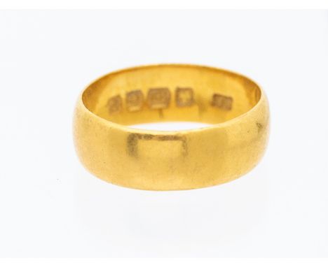 A ladies 22ct gold wedding band, width 6mm, size K, weight approx 4.3gms   Further details: wear commensurate with age   