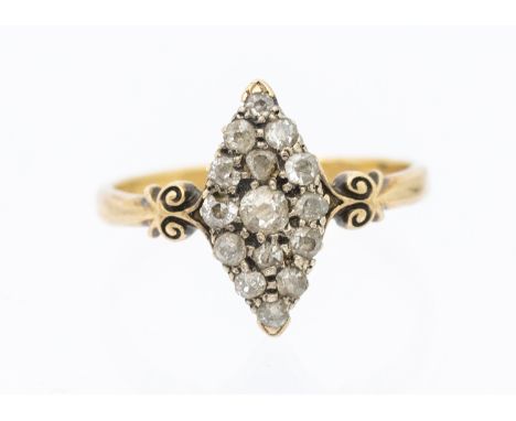 A ladies diamond set 18ct gold ring, comprising a marquise shaped mount set with small diamonds, width approx 13mm, scrolled 