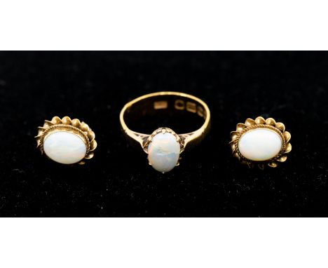 A pearl set 22ct gold single stone ring, set with oval cabochon opal (cracked) width approx 7mm, size J, total gross weight a