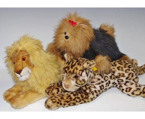 A Steiff recumbent 'Leo lion', a Steiff Jaguar with Jaguar car mascot label; a large Yorkshire terrier Beanie Baby (3)