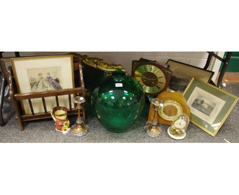 An emerald glass demi-john bottle; acanthus scrolling mirror; magazine rack; an early 20th century mantel clock, an anniversa