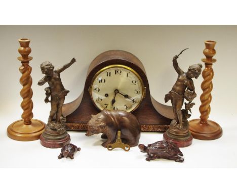 A Napoleon hat oak mantel clock; two spelter figure, Panier de Fruits &amp; La Suprise; treen hardwood bear; tortoises; barle