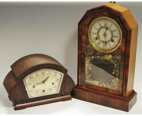 An American walnut mantel clock; an Art Deco oak mantel clock (2)