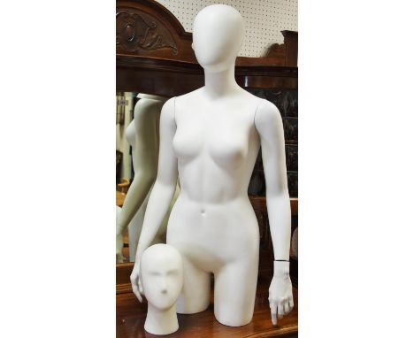 A substantial female shop counter top display mannequin; a head mannequin (2) 