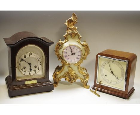 An Art Deco walnut cased Elliott clock (with key); another early 20th century mahogany mantel clock with presentation plaque;