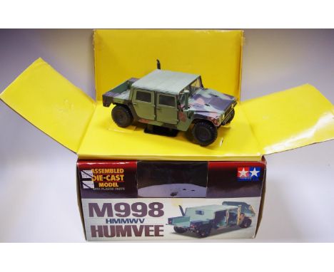 A Tamiya 1:20 Scale Collectors Club M998 HMMWV Humvee, assembled die-cast model,  original windowed box