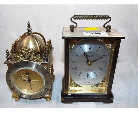 A Swiza wind up alarm clock and a Metamec mantle clock (2)