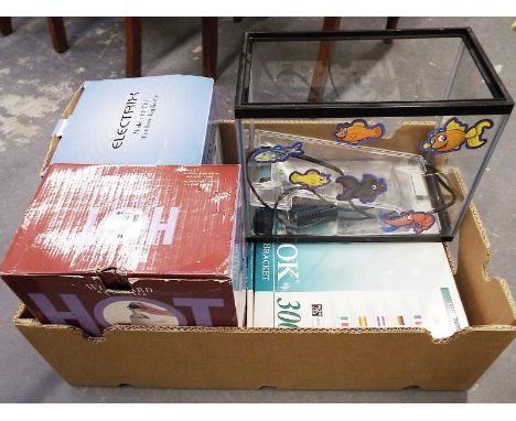 A box containing  a Whittards of Chelsea hot chocolate maker, boxed and  Electrix cordless jug kettle, a Uni-Lok television w