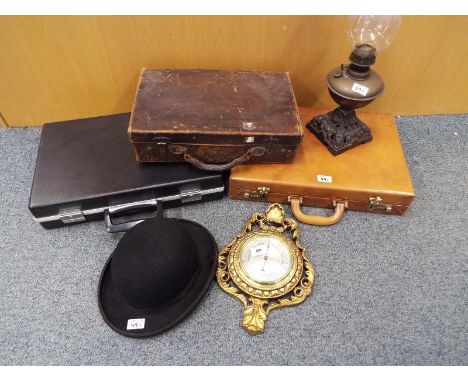 A mixed lot to include a gentleman's bowler hat, suitcases, oil lamp and a barometer (qty)