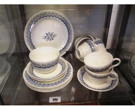A quantity of ceramic tableware by Wedgwood decoration in the Persephone pattern design by Ravilious, comprising approx seven